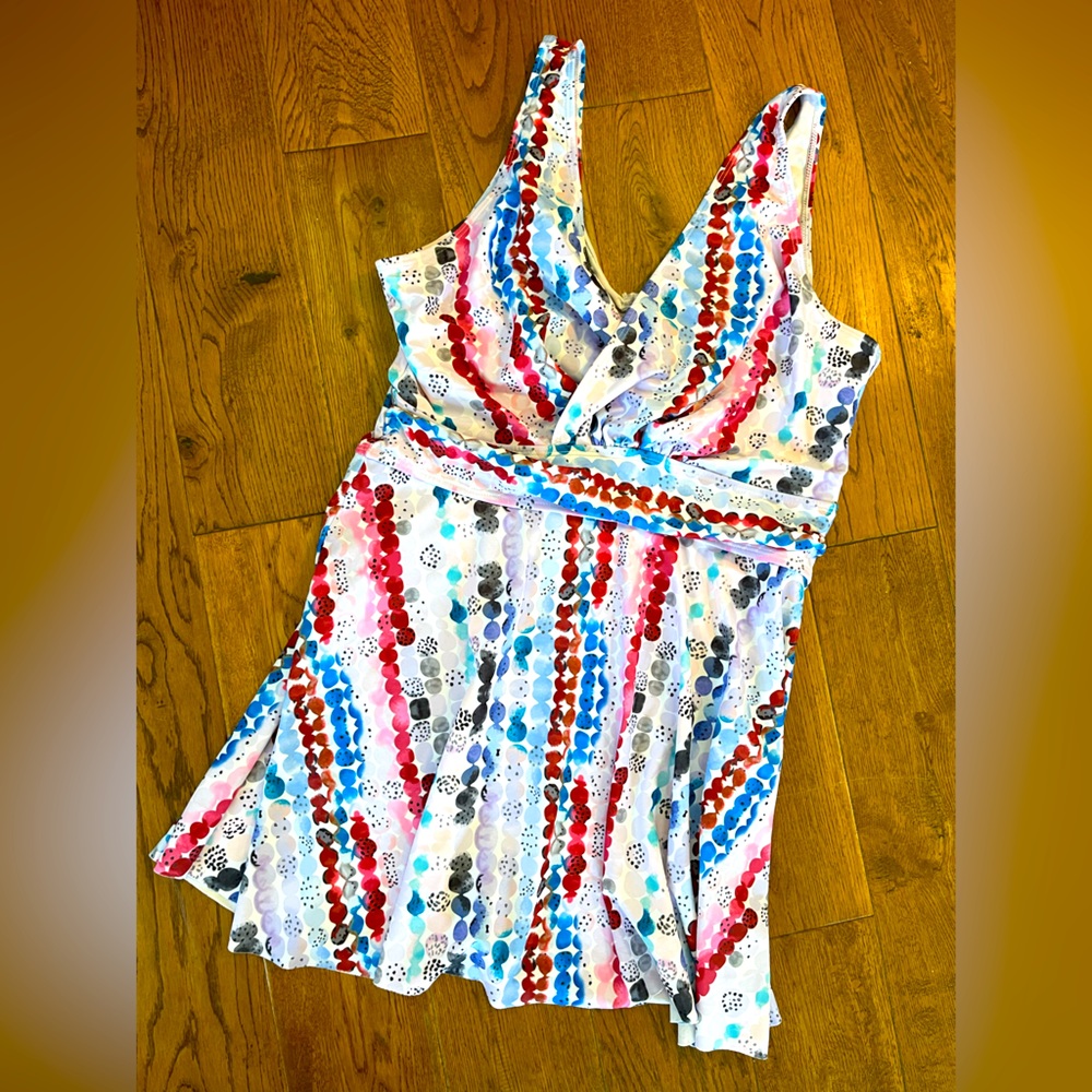 SZ 14 skirt type one piece like new condition swimsuit with shorts type bottoms.